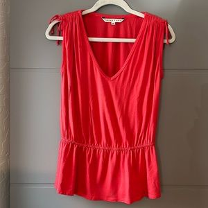 Trina Turk coral top with shoulder ties and peplum, size small